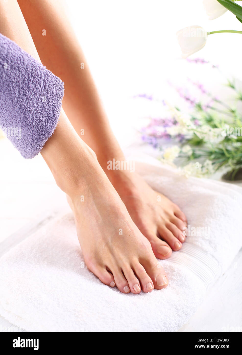 Relaxing foot bath, moment of relaxation. Foot scrub, pedicure