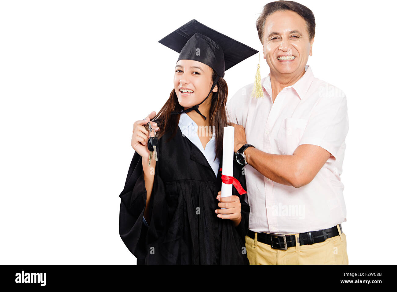 2 indian father and young daughter Student Lawyer showing key new car