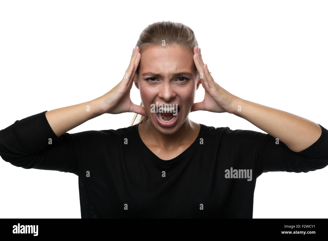Portrait of stressed woman on white background Stock Photo - Alamy