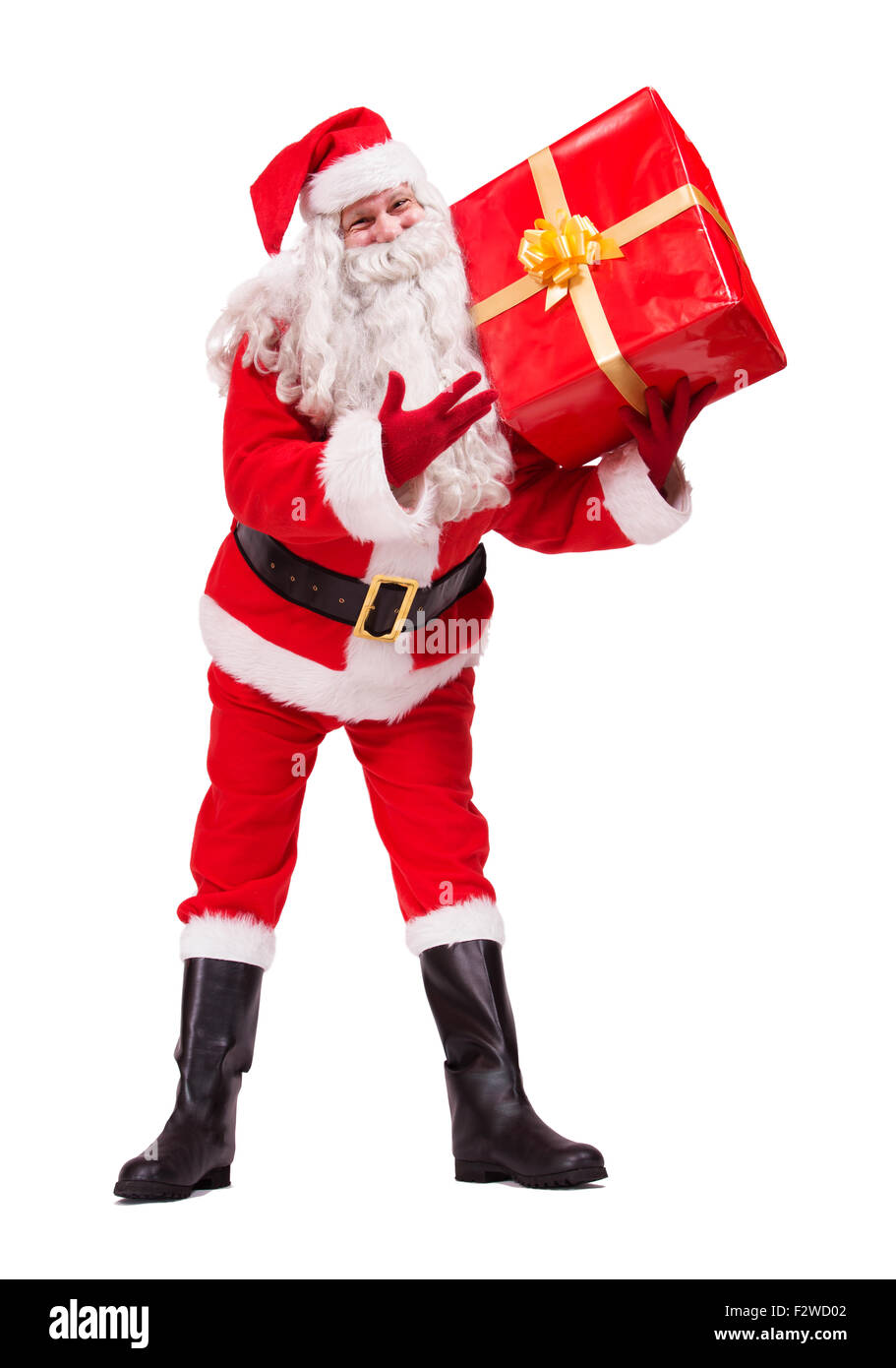 Santa Claus shows gift isolated on white background Stock Photo - Alamy