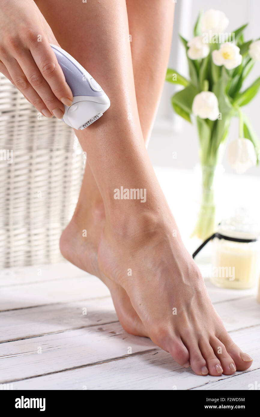 Hair removal, feminine smooth legs.Beautiful female legs shaved smooth