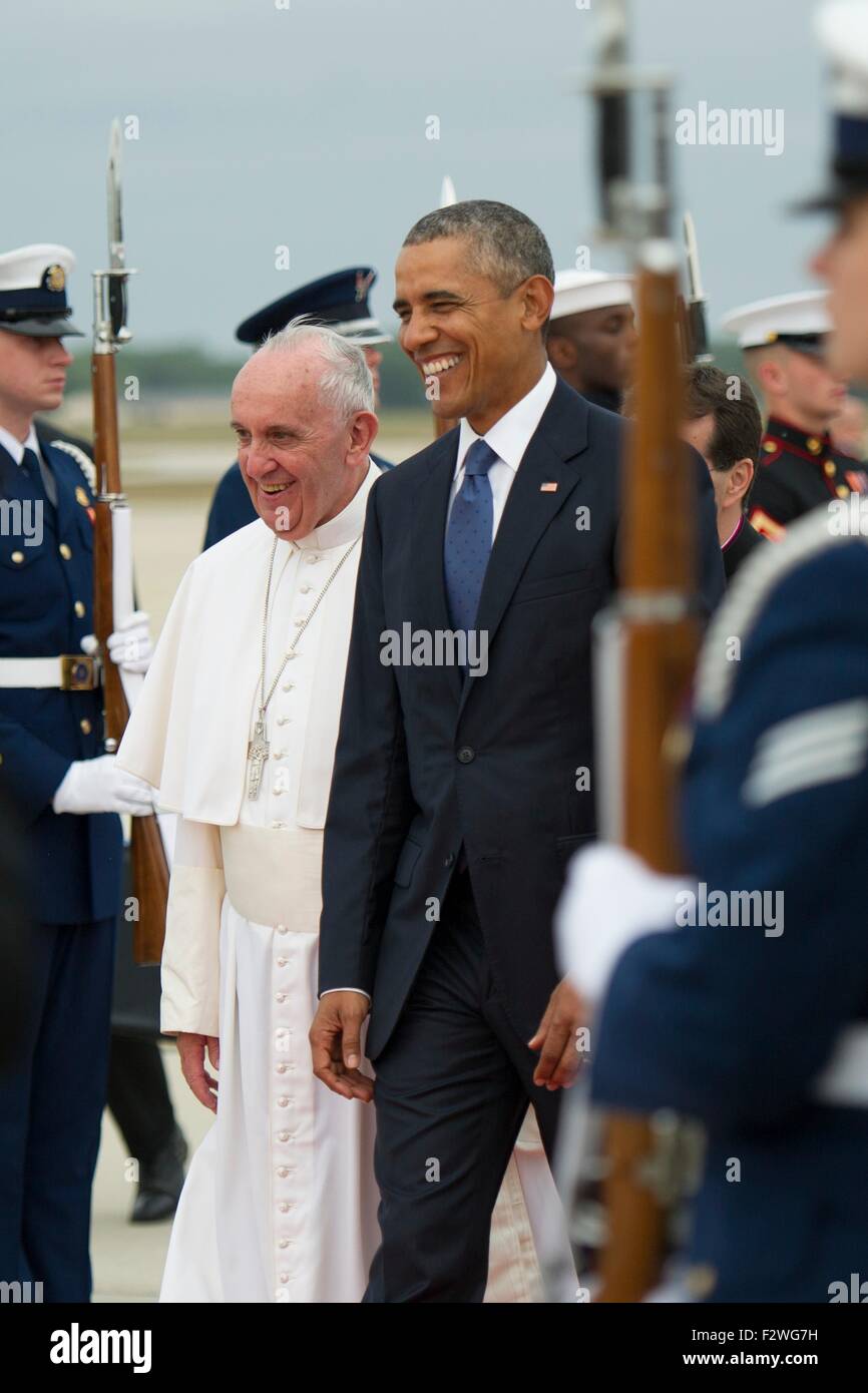 U.S. President Barack Obama escorts Pope Francis as he arrives at Joint Base Andrews September 22, 2015 in Camp Springs, Maryland. This is the first visit by Pope Francis to the United States. Stock Photo