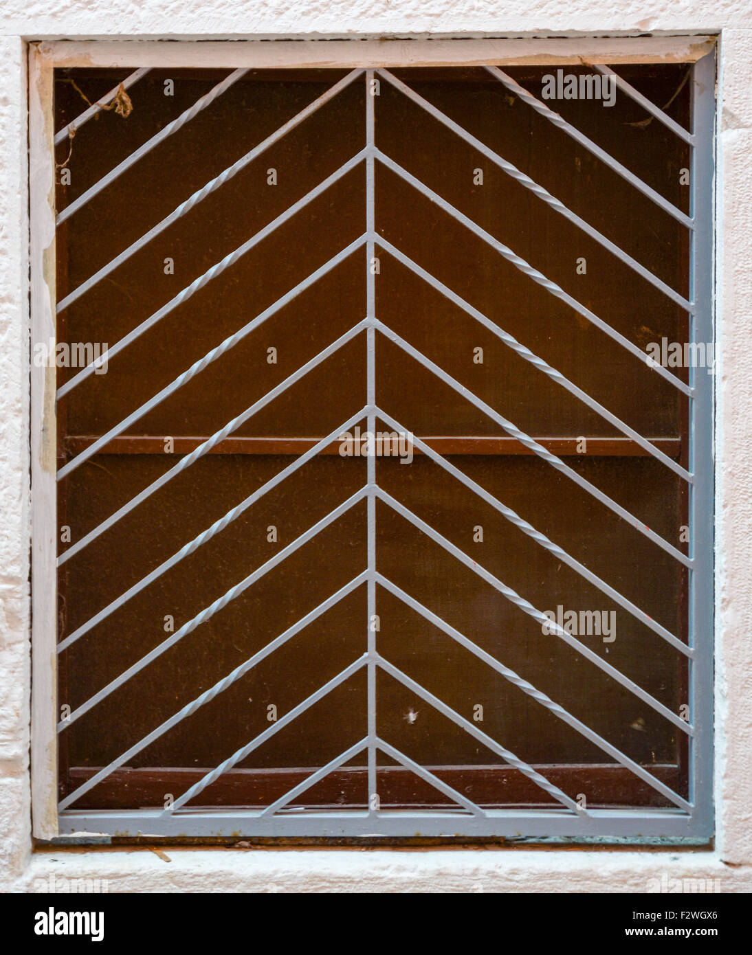 an old window with the metal bars Stock Photo - Alamy