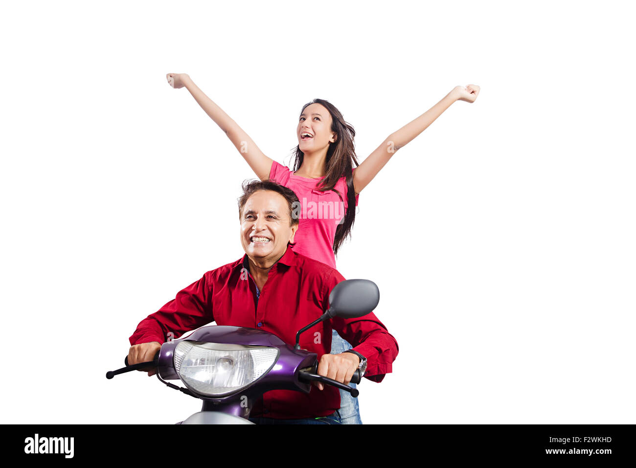 2 indian father and young daughter Scooty Riding fun enjoy Stock Photo