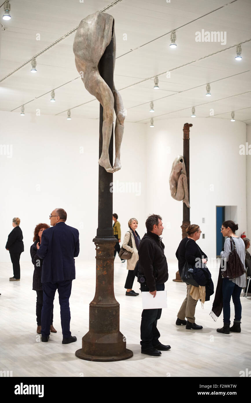 Visitors examine works of art as they group around the sculpture 'Schmerzensmann V' by artist Berlinde De Bruyckere at the exhibition 'The Problem of God' in Duesseldorf, Germany, 24 September 2015. The exhibition deals with Christian iconography of contemporary artists und rund from 26 September 2015 to 24 January 2016. Photo: Bernd Thissen/dpa Stock Photo