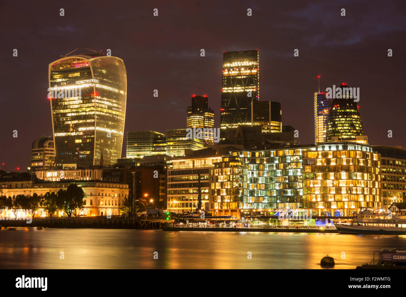City of London skyline financial district lit up at night River Thames City of London UK GB EU Europe Stock Photo
