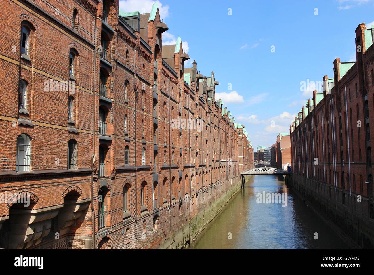 The famous „Speicherstadt“ in Hamburg, Germany, Europe. Old storehouses and canal in late afternoon. Stock Photo