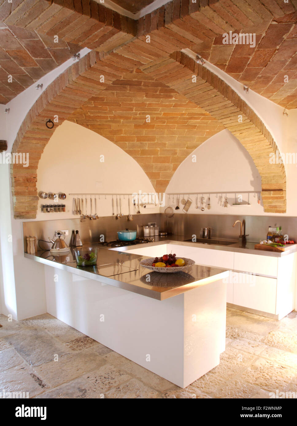 Vaulted Brick Ceiling In Contemporary Italian Kitchen With Granite