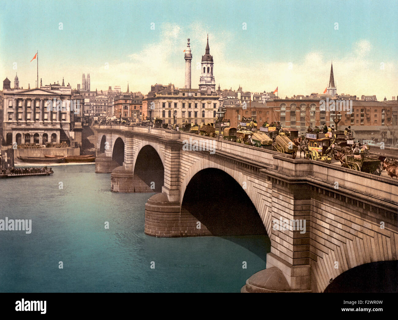 London, England.  London Bridge spanning the River Thames.  This late 19th century photograph shows the Victorian stone arch version of the bridge which existed from 1832 until 1968. Stock Photo