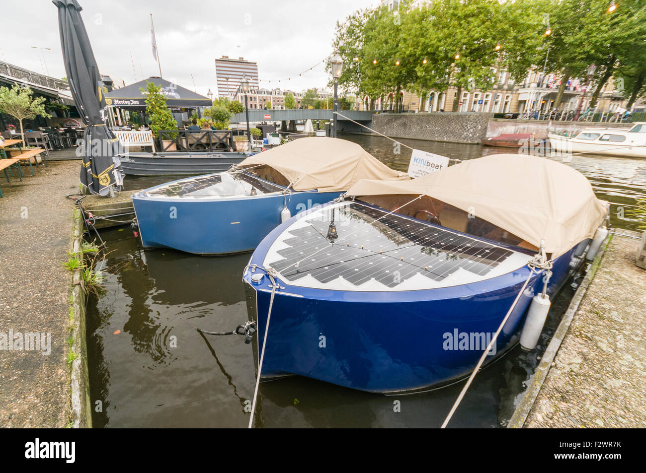 Solar powered electric boats on a canal in Amsterdam Stock Photo Alamy