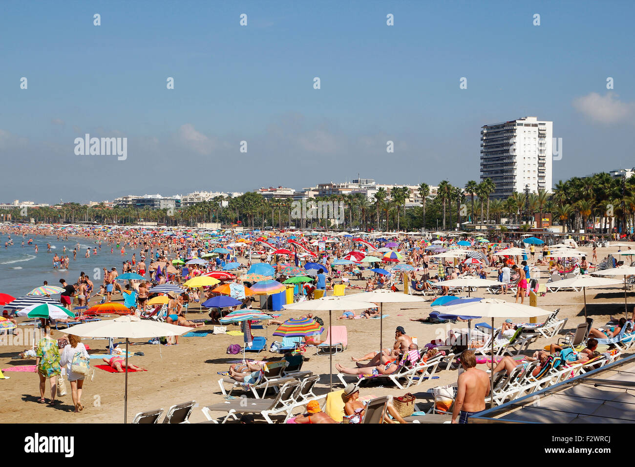 People relaxing and having fun on the beach of Salou, Spain Stock Photo ...