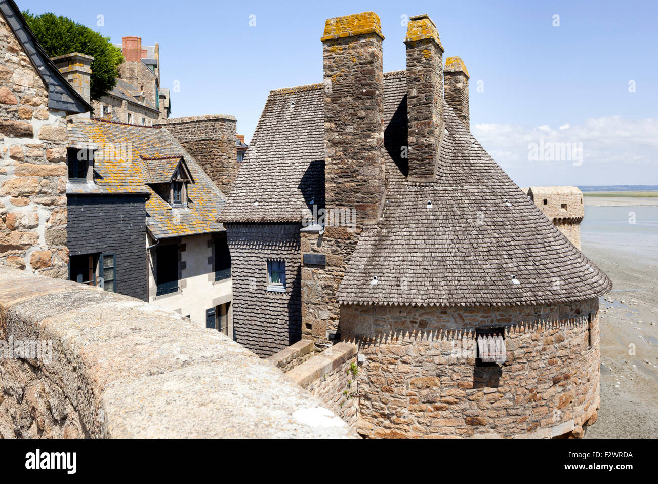 The ramparts and one of the turrets at Mont Saint Michel, Normandy, France - Mont St Michel Stock Photo