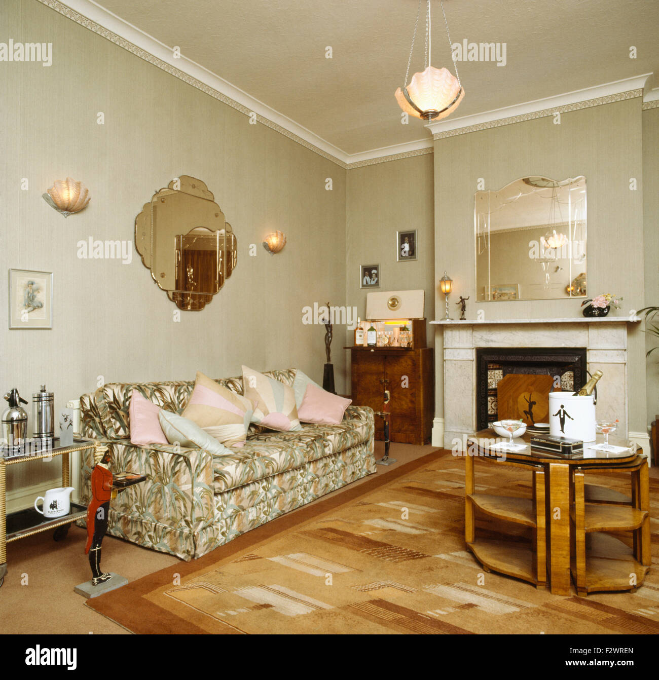 Forties style living room with patterned sofa and a veneered coffee table Stock Photo