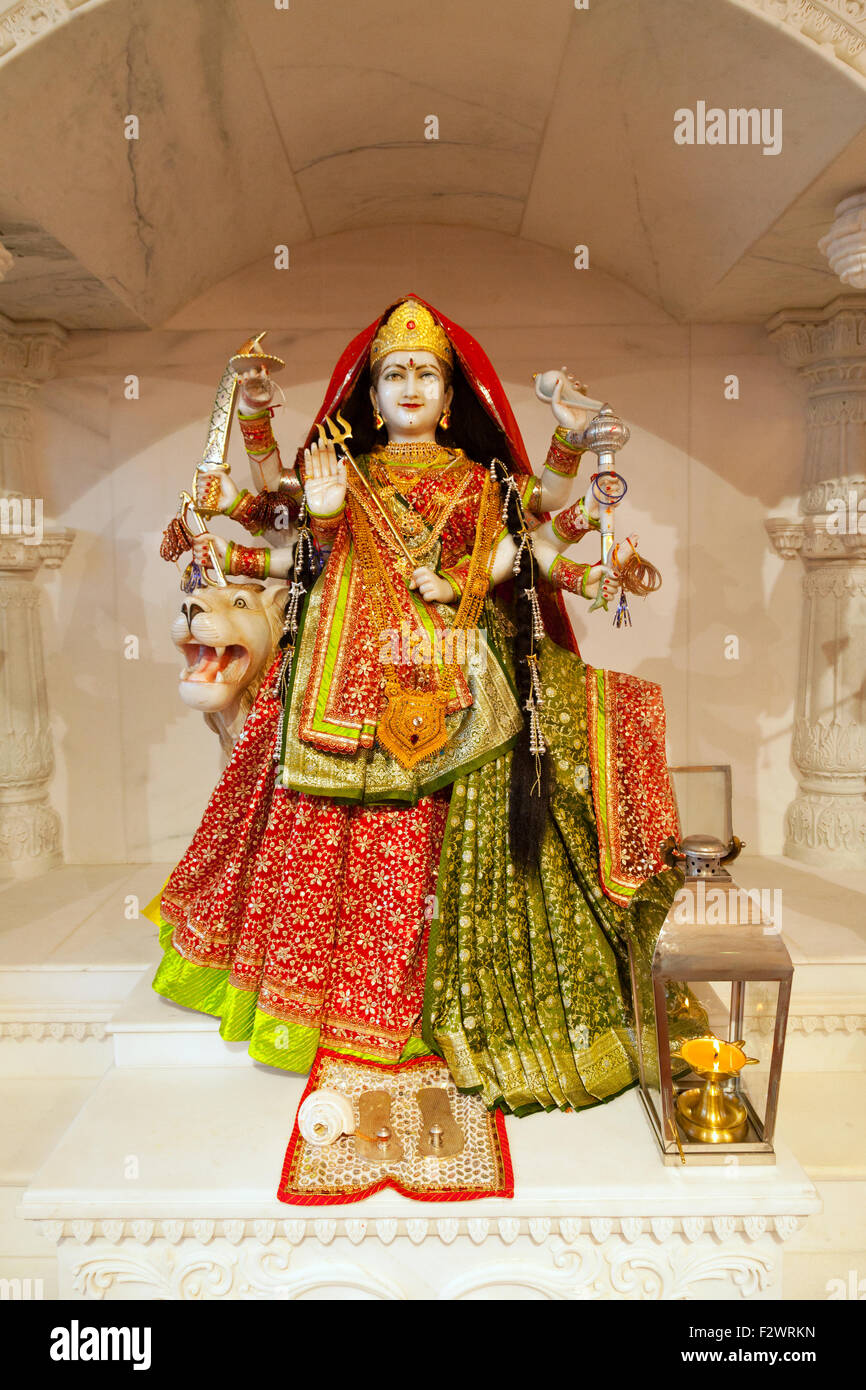 A statue of the Hindu God Durga, a warrior goddess; Reading Hindu Temple, Reading Berkshire England UK Stock Photo