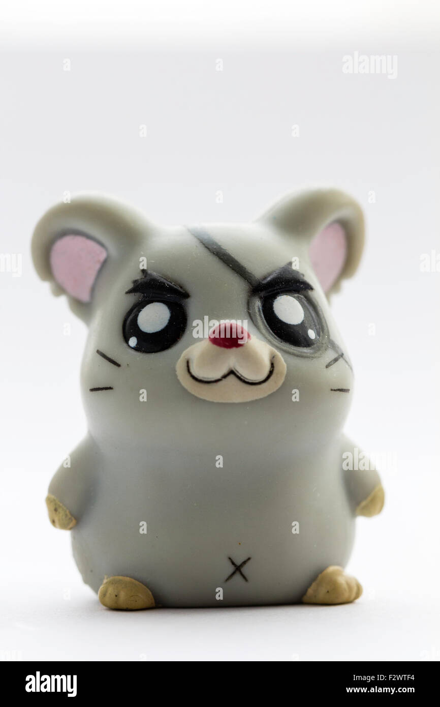 Japanese plastic Hamtaro hamster cartoon character, Sabu, from the Ham-Ham gang, hamster. Anime figures. Anime figure against white background. Stock Photo