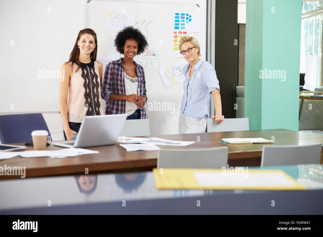 Portrait Of Businesswomen Having Creative Meeting In Office Stock Photo ...