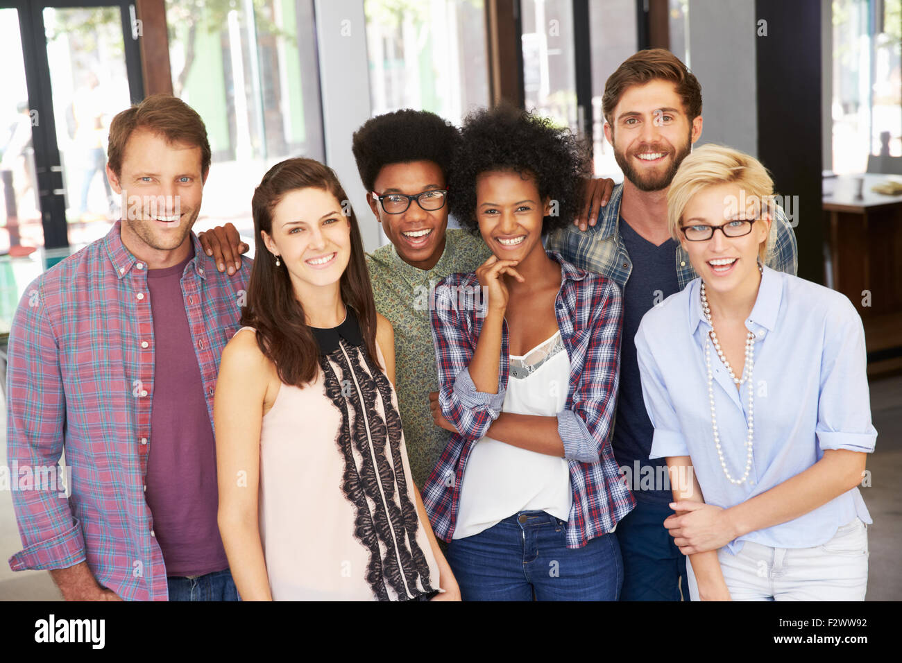 Portrait Of Businesspeople Standing In Modern Office Stock Photo - Alamy