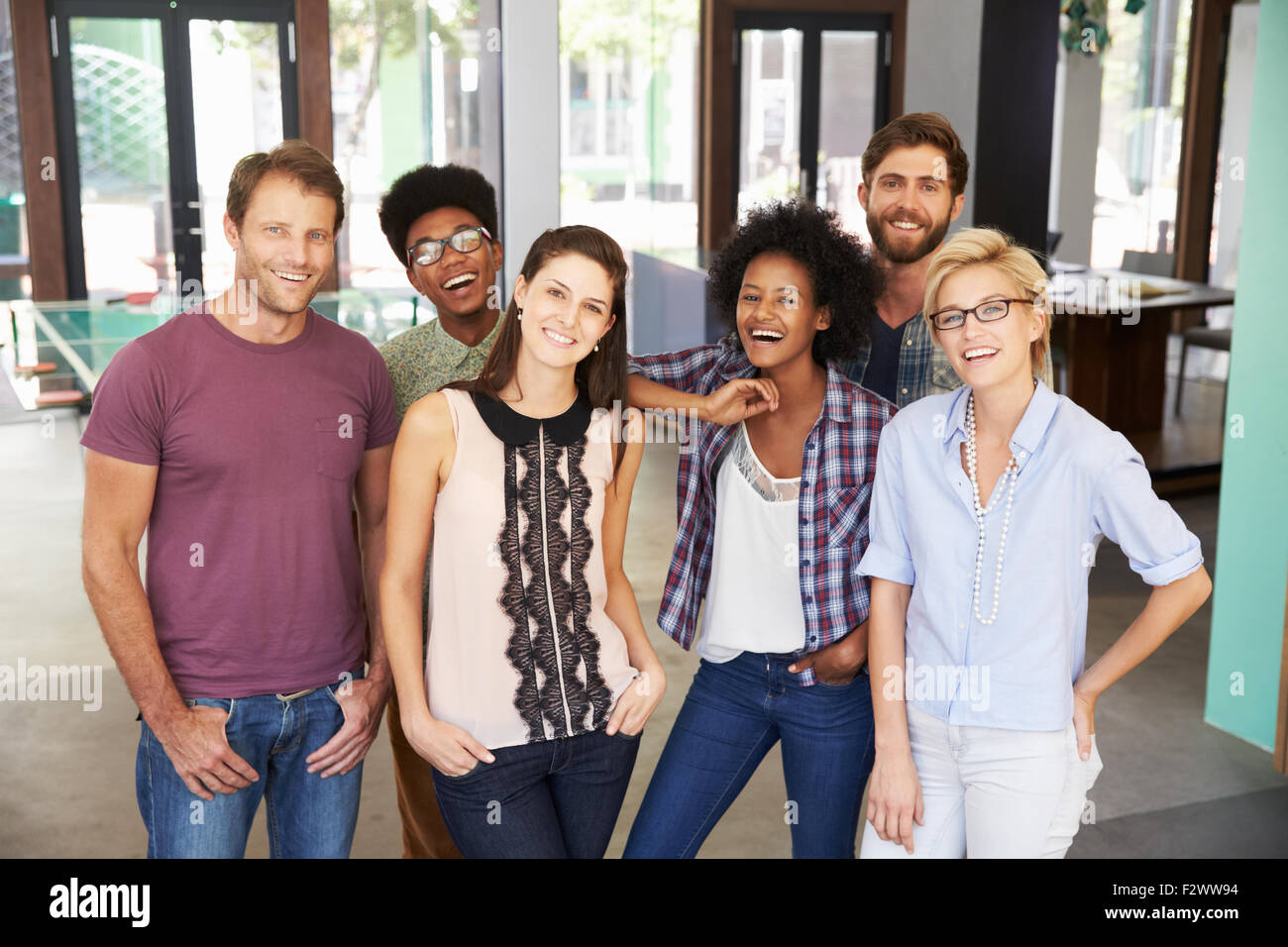 Portrait Of Businesspeople Standing In Modern Office Stock Photo - Alamy