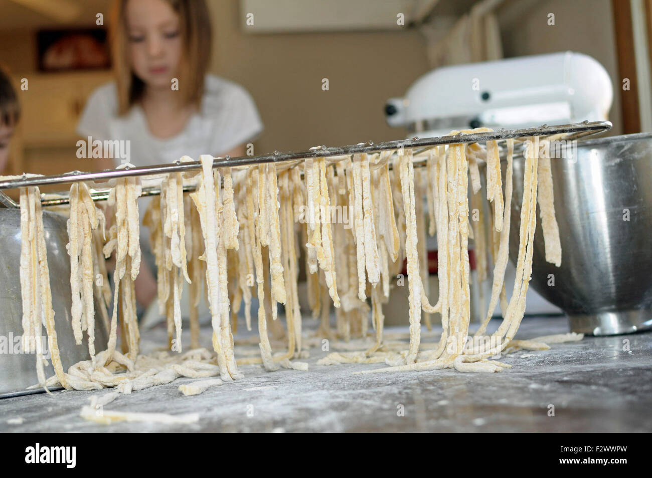 making and drying noodles Stock Photo