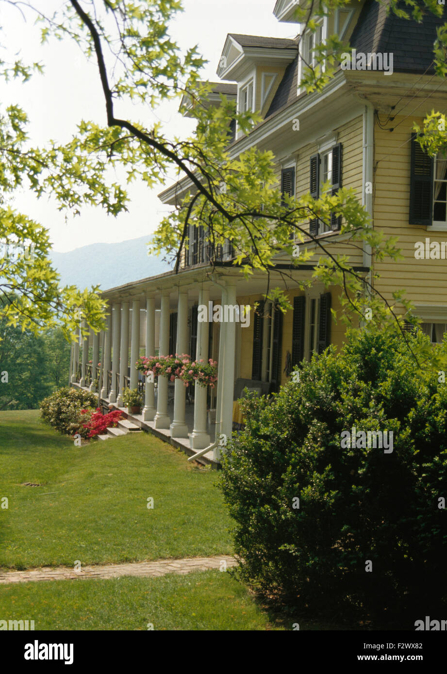 Exterior of large painted clapboard house Stock Photo Alamy