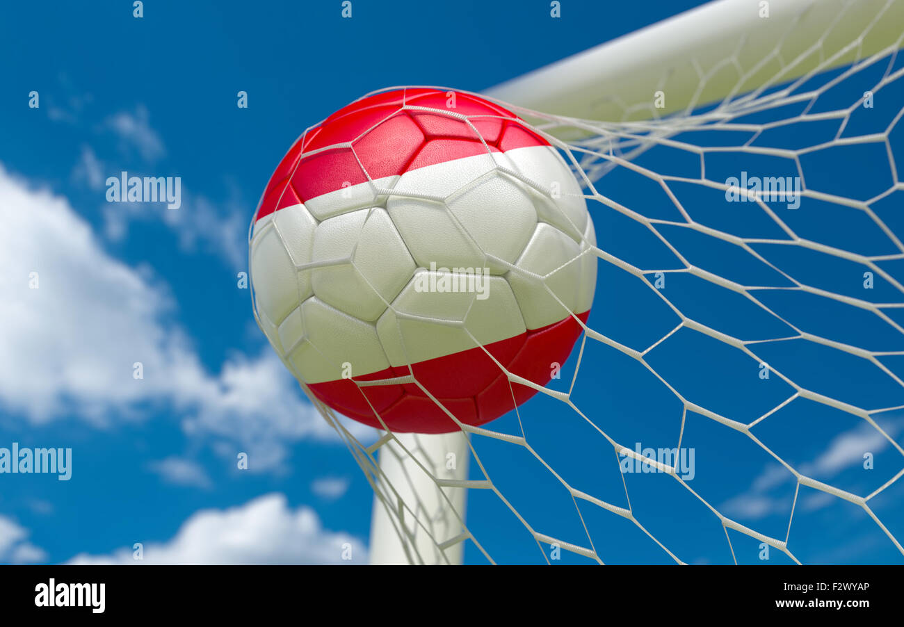 Austria flag and soccer ball, football in goal net Stock Photo - Alamy