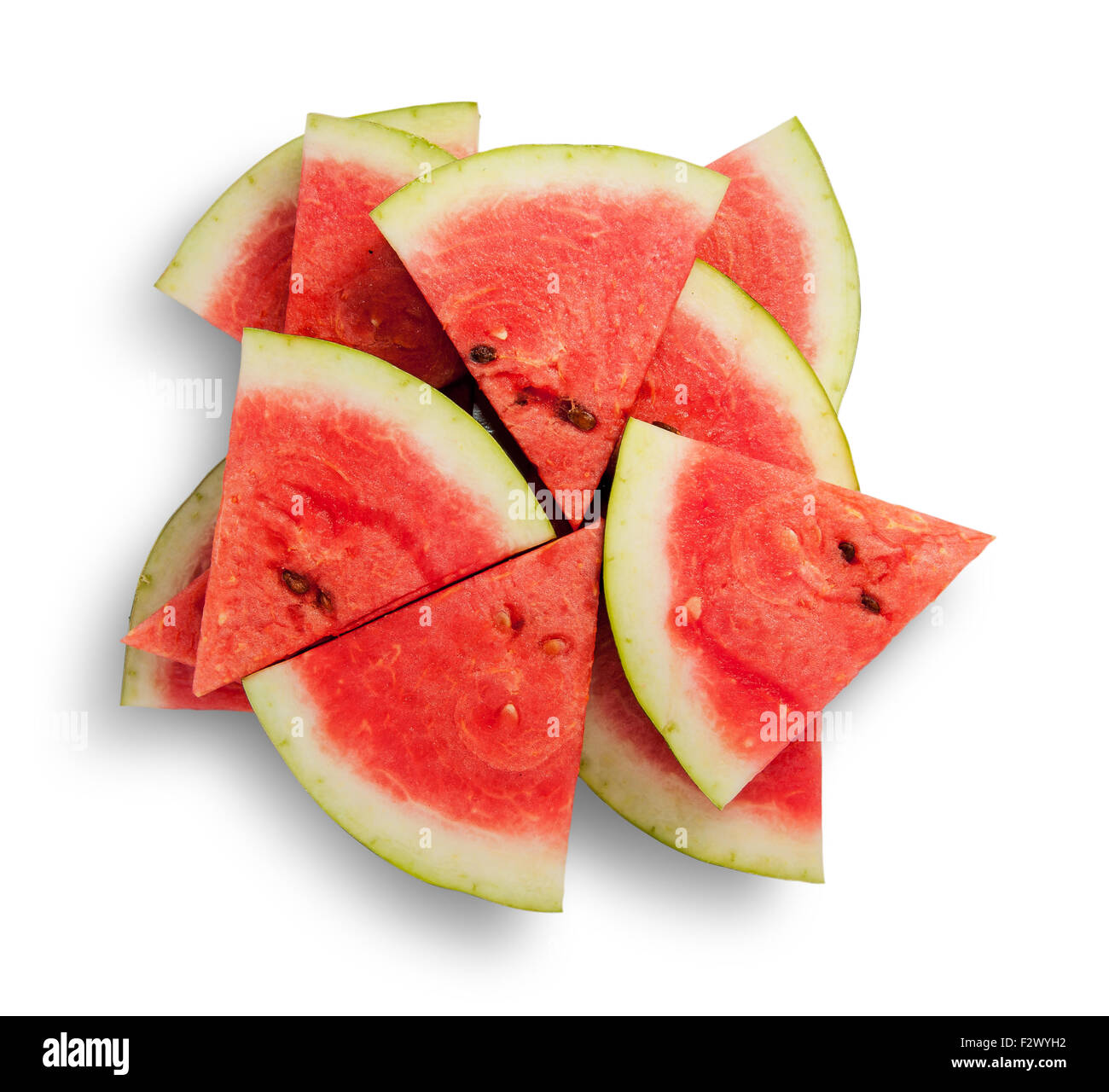 Slices of watermelon in a chaotic stack isolated on white background Stock Photo