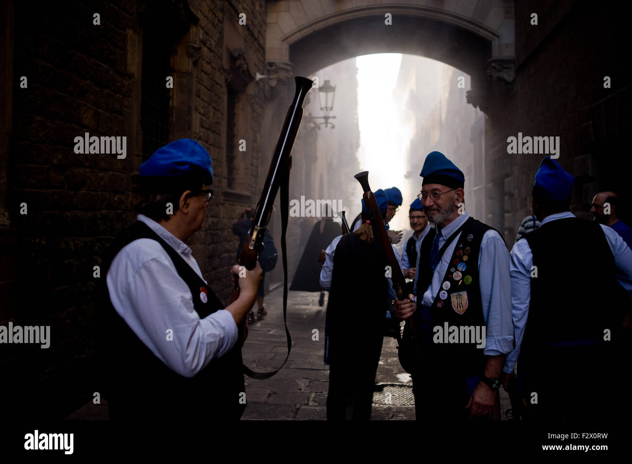 Barcelona, Catalonia, Spain. 24th Sep, 2015. Trabucaires through the streets of Barcelona on the occasion of the celebrations of the Merce Festival (Festes de la Merce) on 24 September 2015, Spain. The Galejada Trabucaire marks the beginning of the day of the patron saint of Barcelona, La Merce. Men and women dressed as ancient Catalan bandits take to the streets of the old part of Barcelona and cause a loud noise with his blunderbusses full of gunpowder. © Jordi Boixareu/ZUMA Wire/Alamy Live News Stock Photo