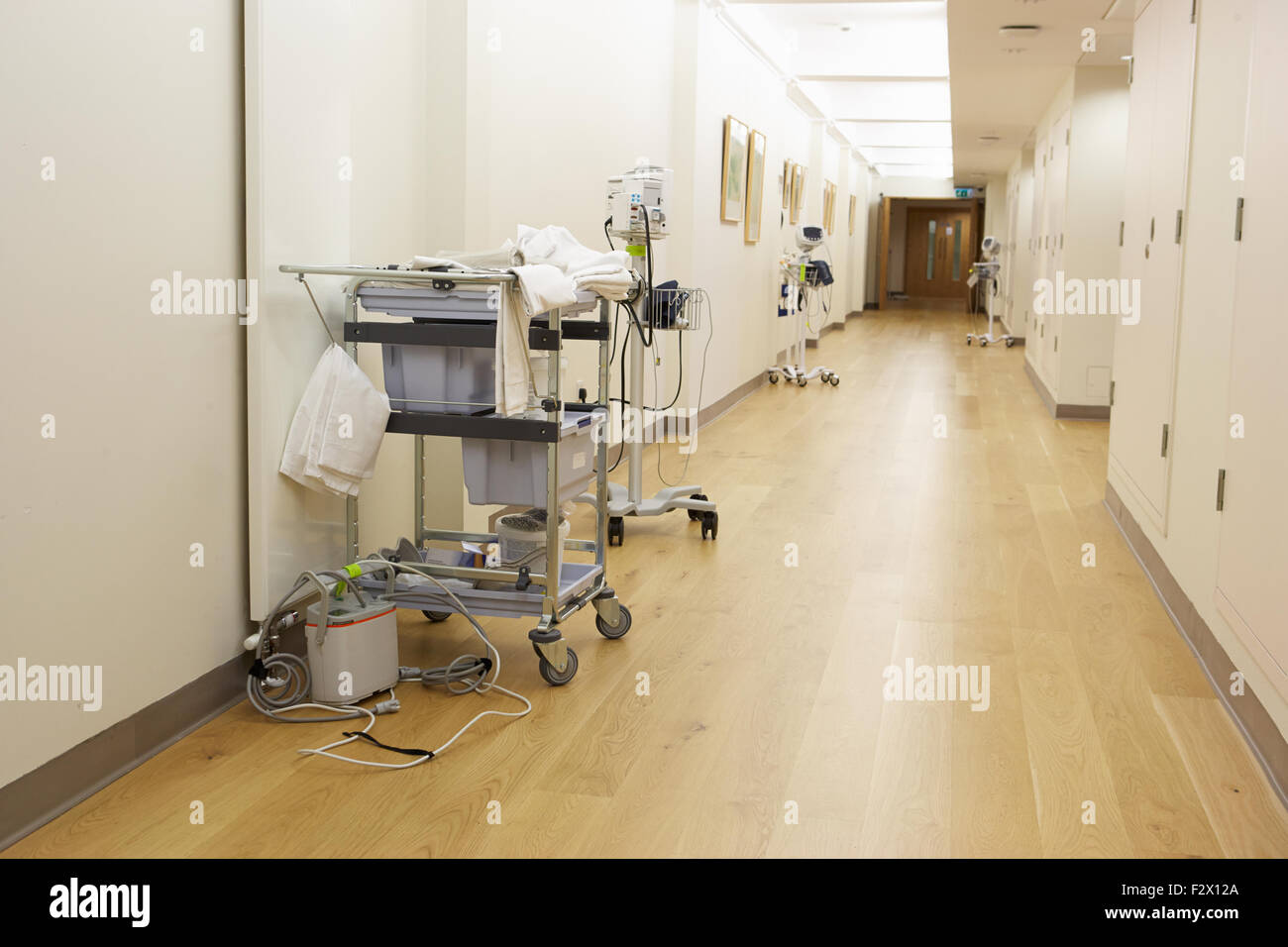 Empty Corridor With Medical Equipment In Modern Hospital Stock Photo