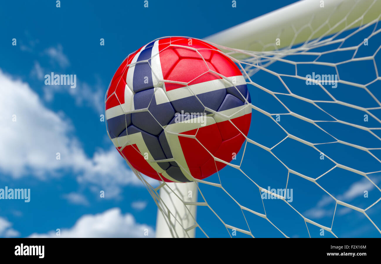 Norway flag and soccer ball, football in goal net Stock Photo - Alamy