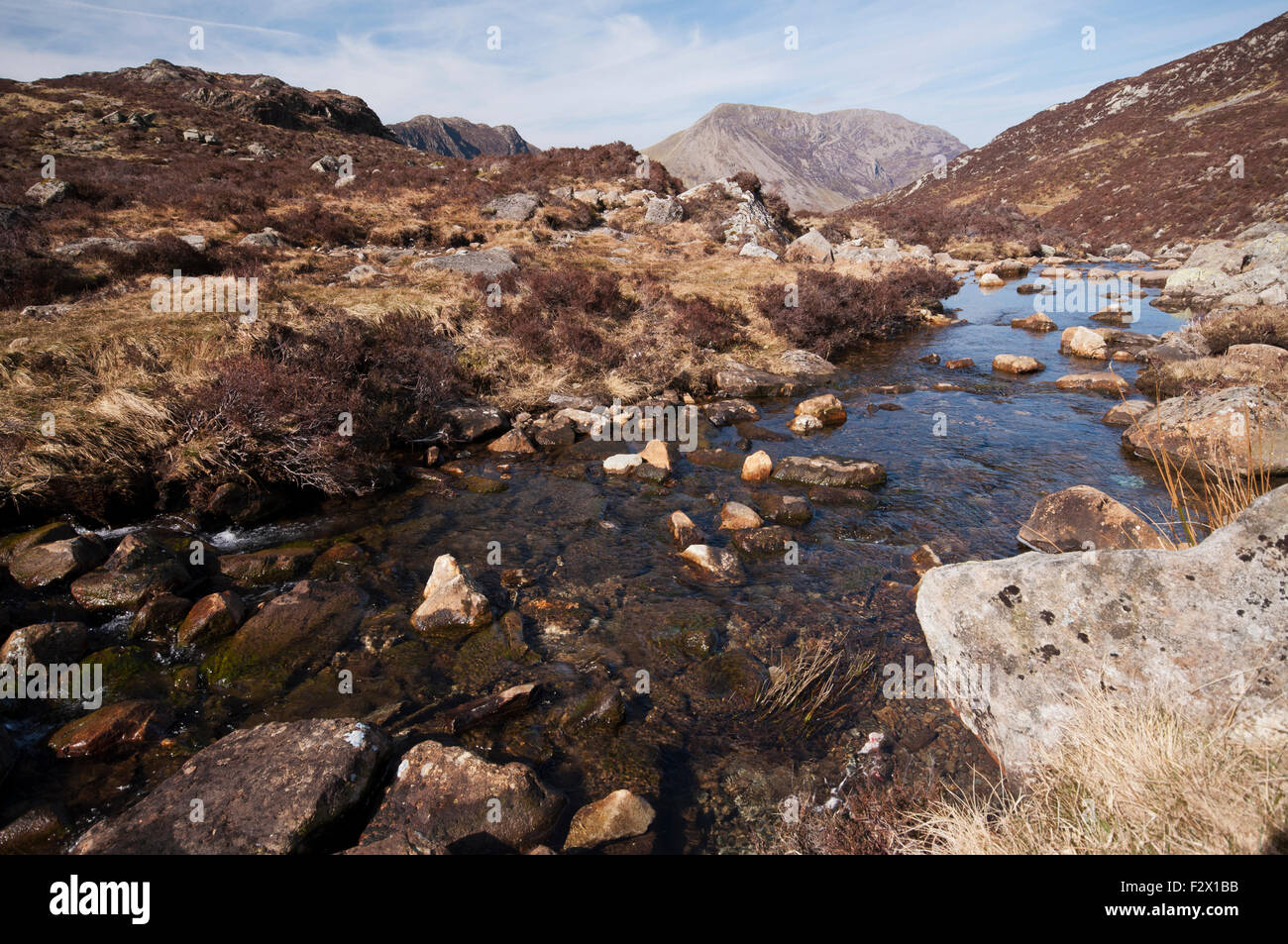 The High Stile range seen in the distance from the path linking Haystacks to Honister Hause. Stock Photo