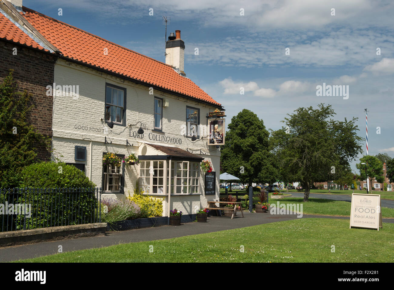 Sunny Summer View Of Attractive Traditional Old English Rural