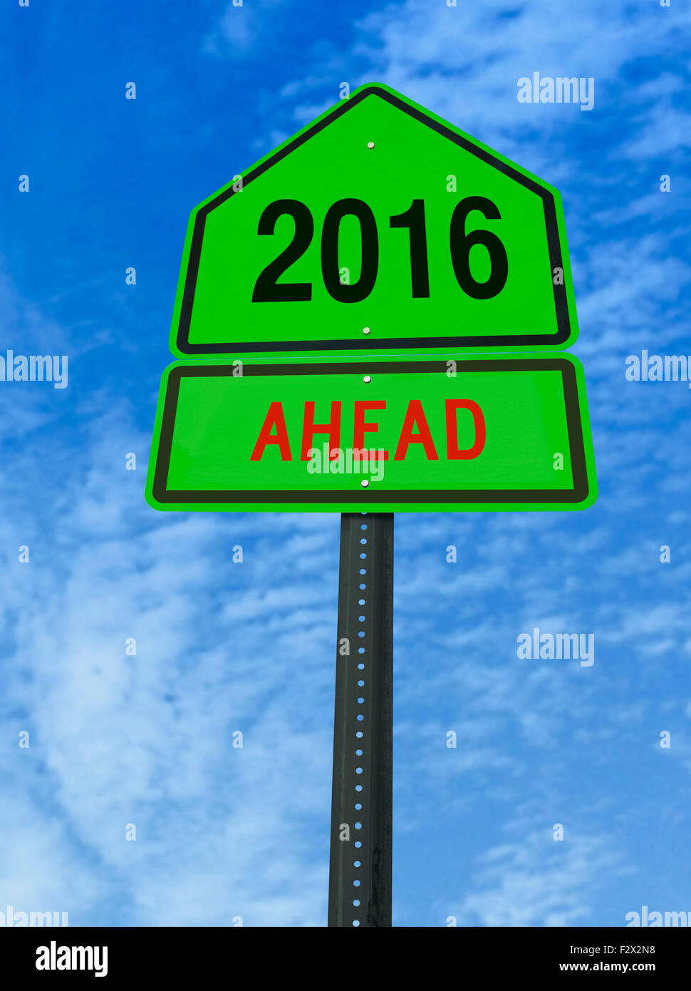 2016 ahead road sign over blue sky with clouds Stock Photo - Alamy