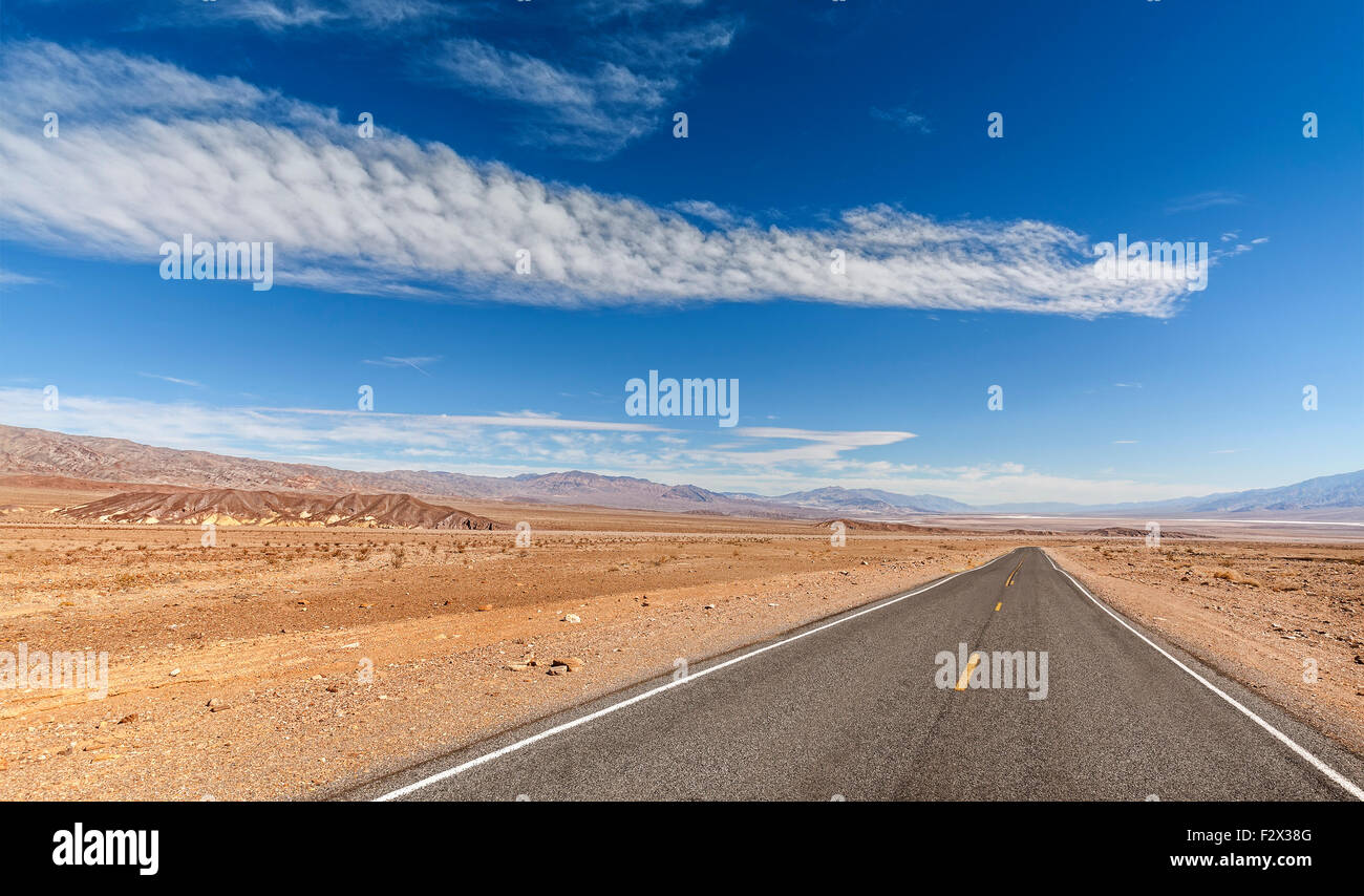 Endless country highway, Death Valley National Park, California, USA. Stock Photo