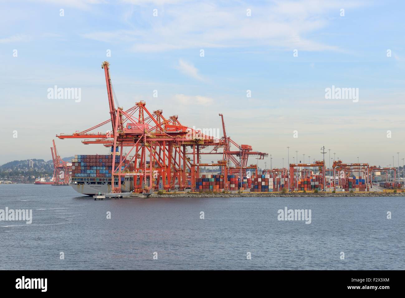 Large container ship loading at the Port of Vancouver container port
