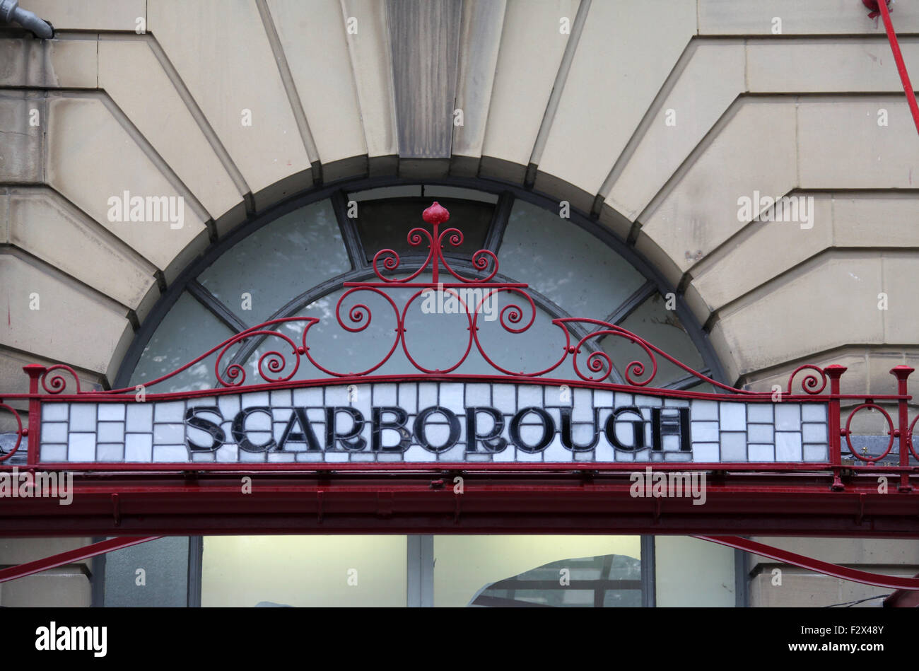 Destination name in the wrought iron and glass canopy of Victoria Station at Manchester Stock Photo