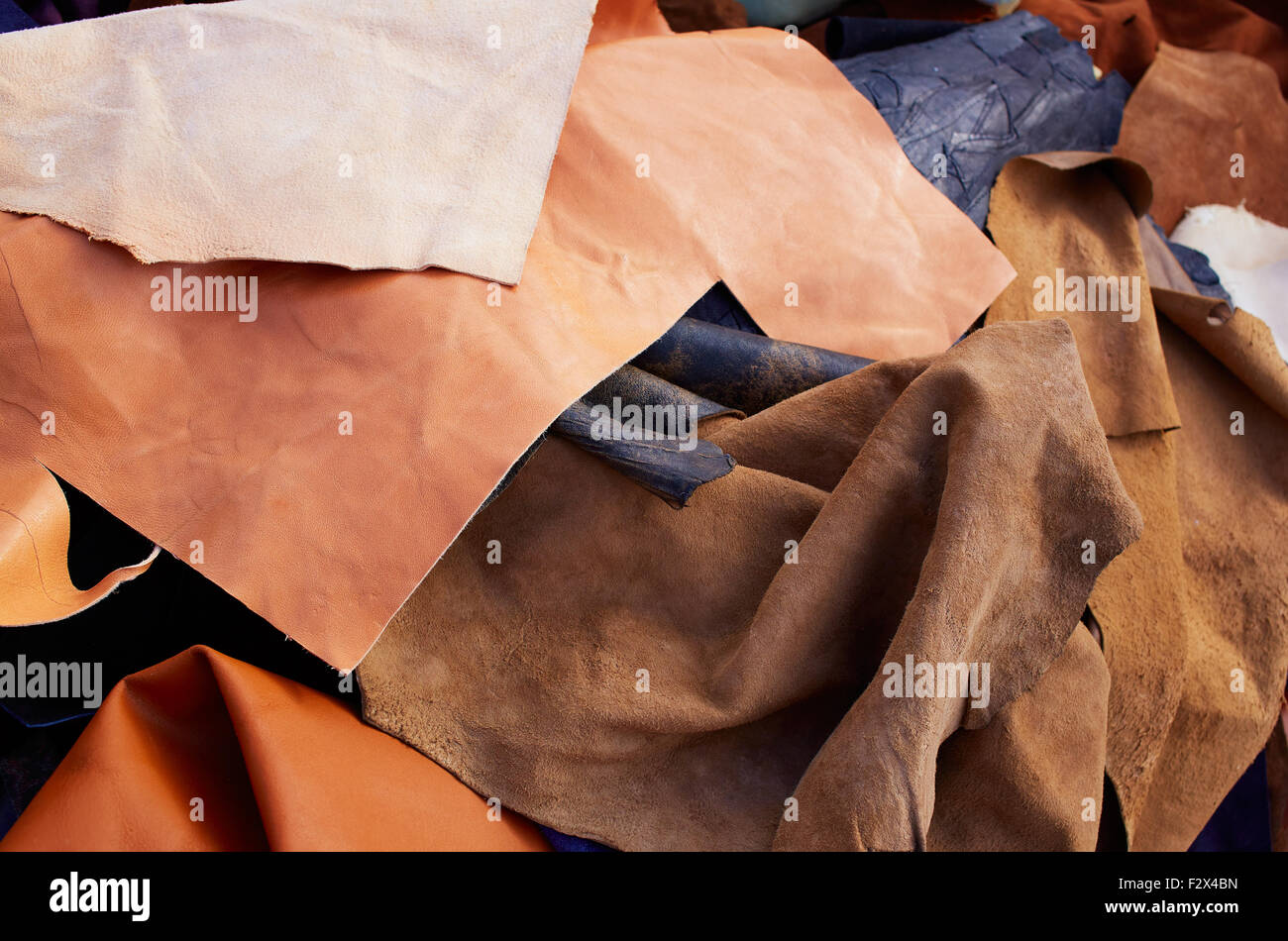 buckskin suede leather messy mixed tanner materials Stock Photo