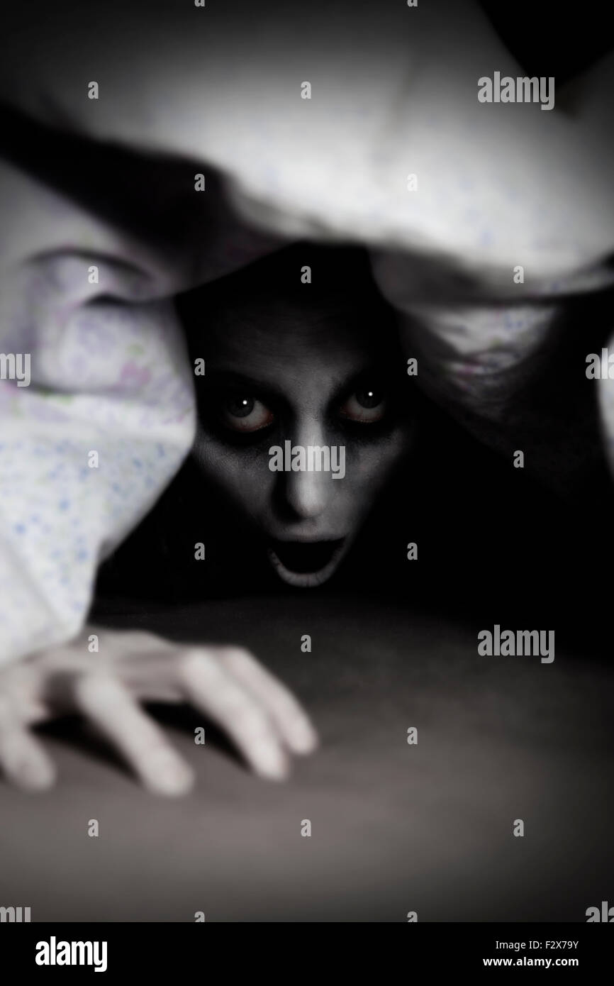 Starring ghost under a blanket Stock Photo Alamy