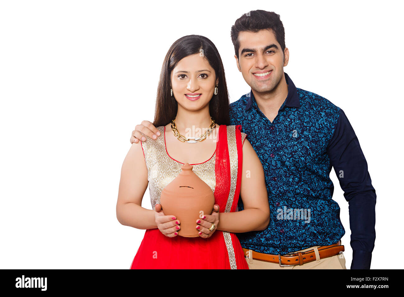 2 indian Married Couple Diwali Festival Piggy Bank Money shwoing Stock ...