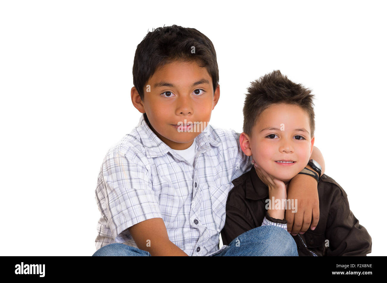 Two boys with arms around each other hi-res stock photography and ...