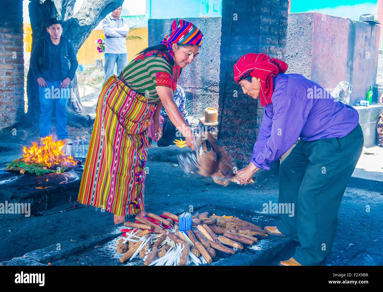 Guatemalan people take part in a traditional Mayan ceremony in Chichicastenango , Guatemala Stock Photo