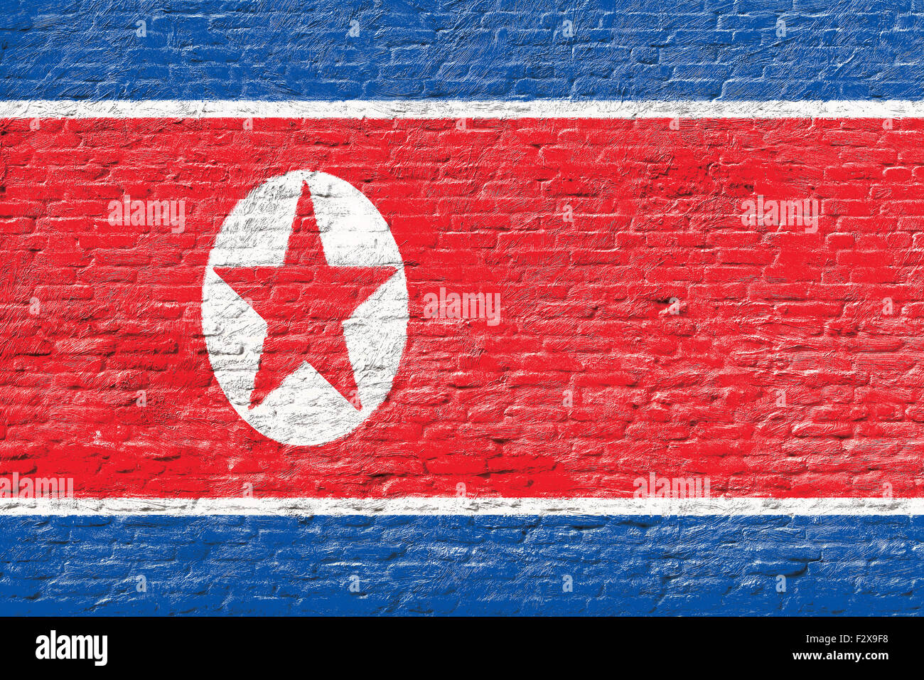 North Korea - National flag on Brick wall Stock Photo