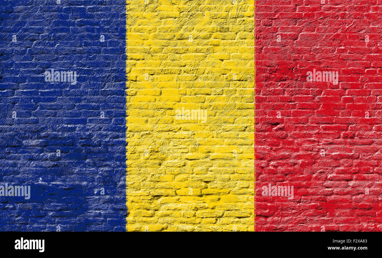 Romania - National flag on Brick wall Stock Photo