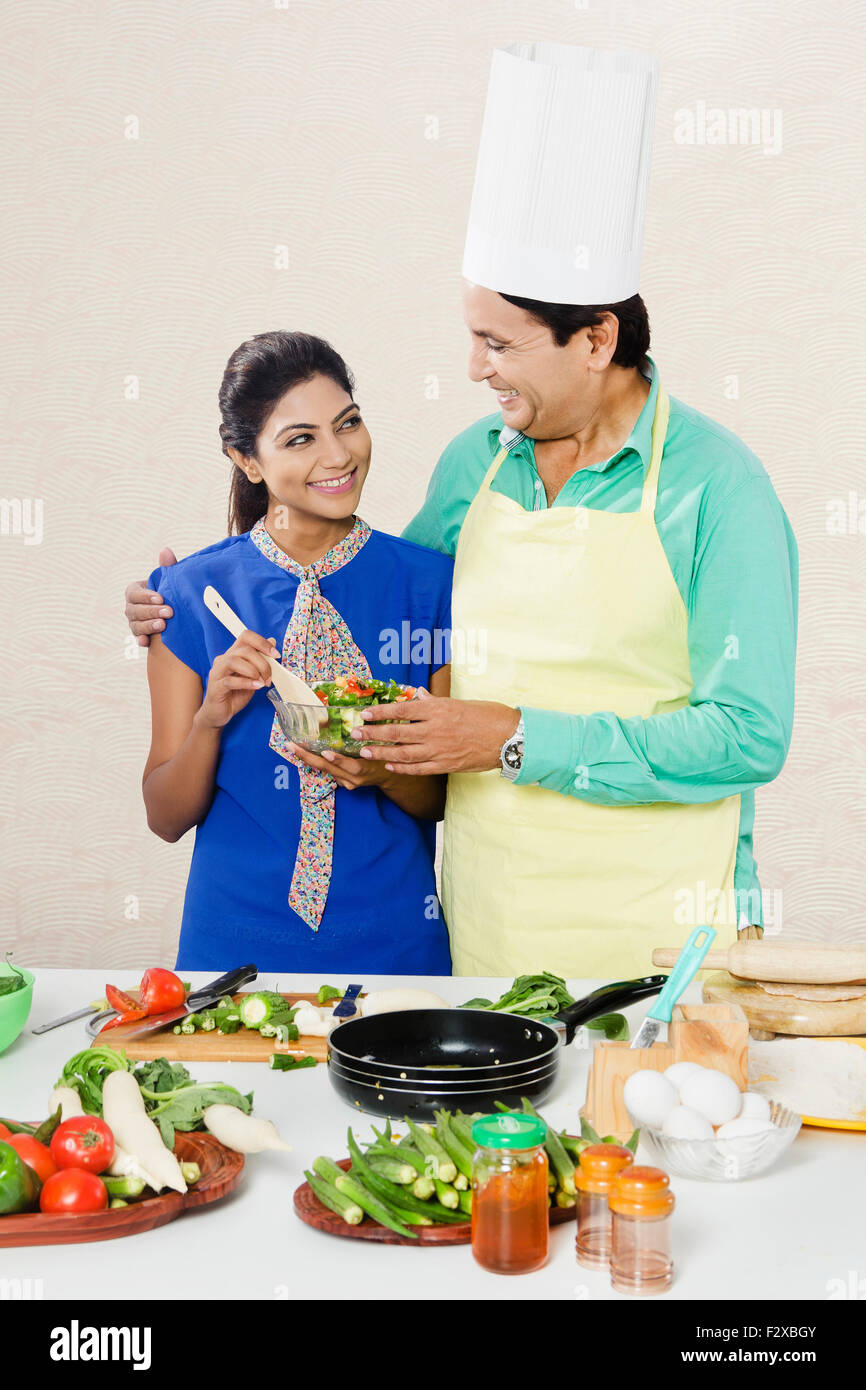 2 indian father and daughter Kitchen Cooking Stock Photo