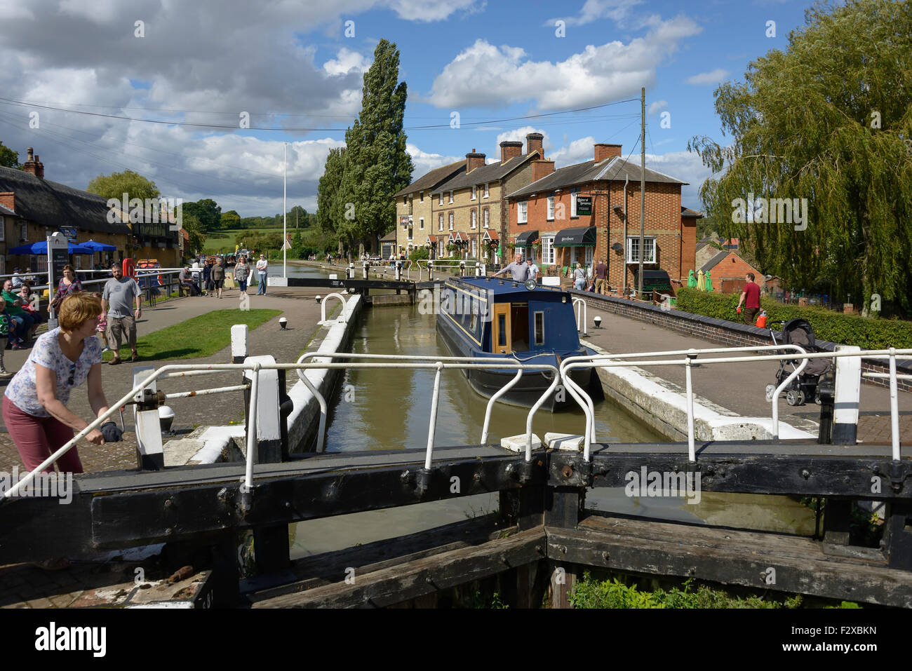 Canal boat in the top lock of the Stoke Bruerne flight, Stoke Bruerne, Northamptonshire, England, United Kingdom Stock Photo