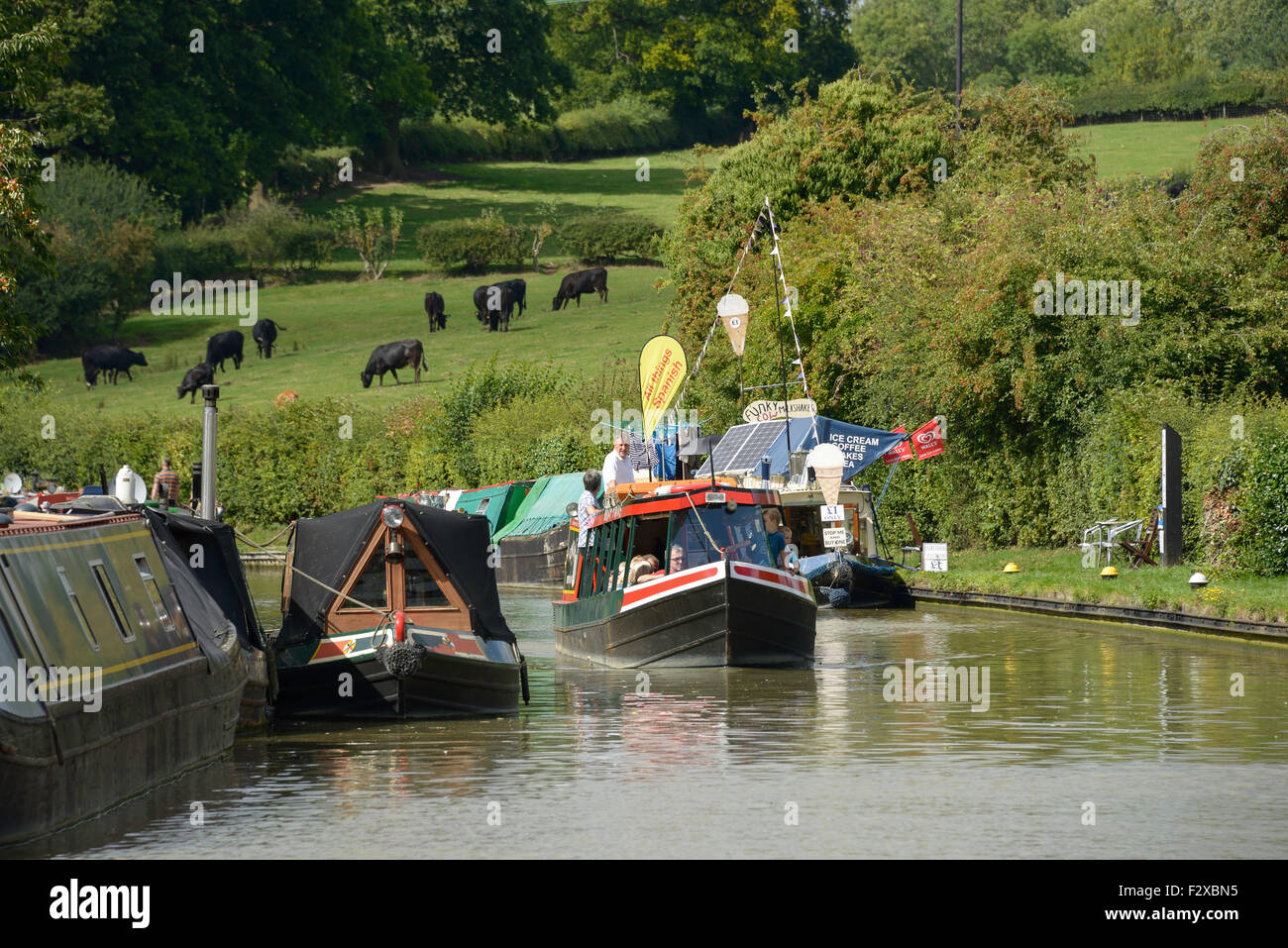 Cruise boat on Grand Union Canal, Stoke Bruerne, Northamptonshire, England, United Kingdom Stock Photo