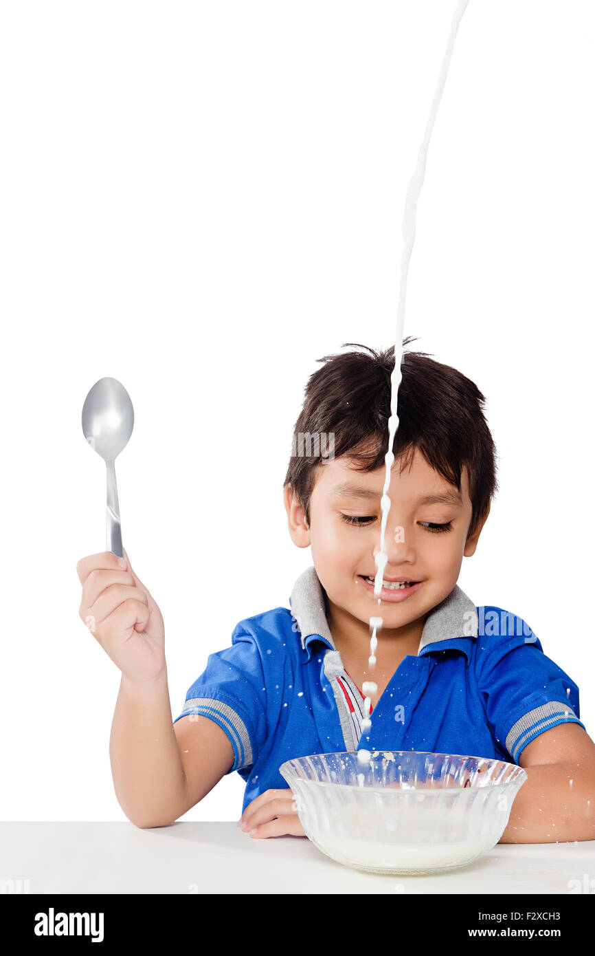 1 indian Kid boy Breakfast Drinking milk Breakfast Stock Photo - Alamy