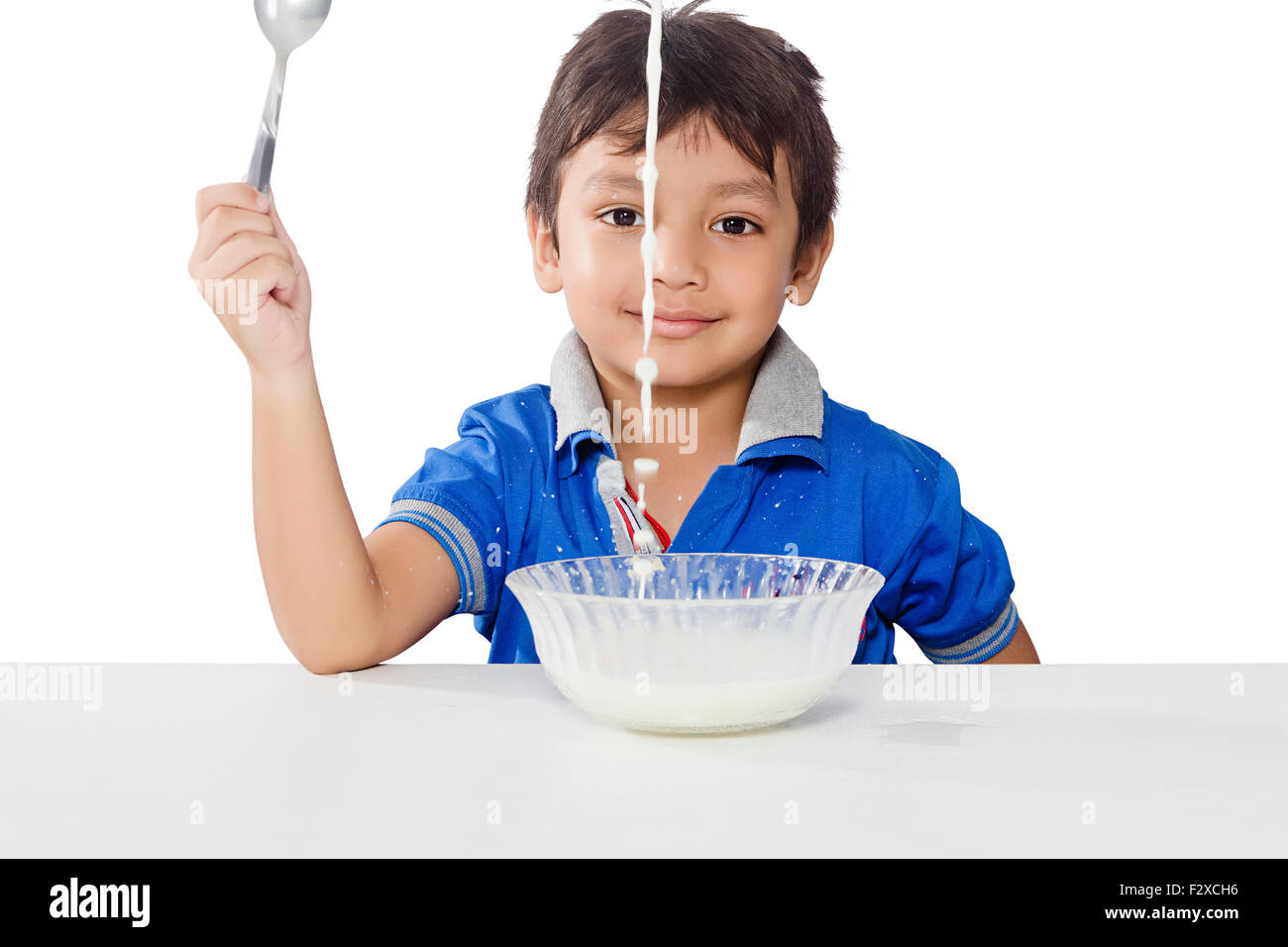 1 indian Kid boy Breakfast Drinking milk Breakfast Stock Photo - Alamy