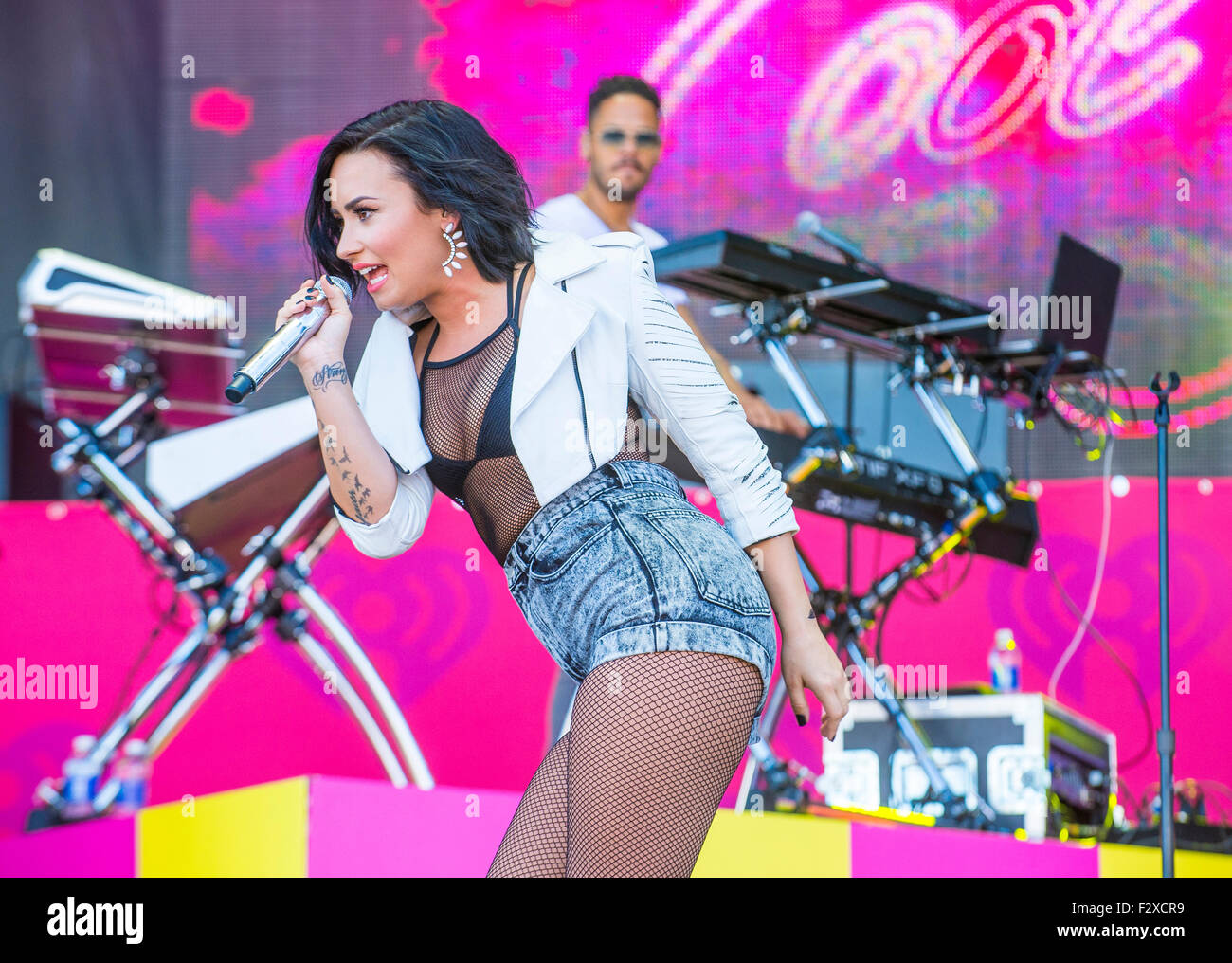 Recording artist Demi Lovato performs onstage at the 2015 iHeartRadio Music Festival at the Las Vegas Village Stock Photo