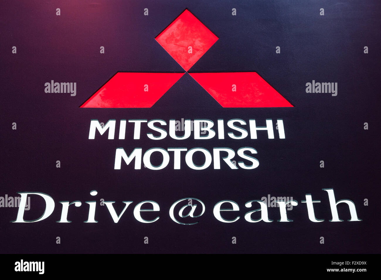 Mitsubishi Motors Company Logo and the new slogan Drive@earth at the IAA International Motor Show 2015. Stock Photo