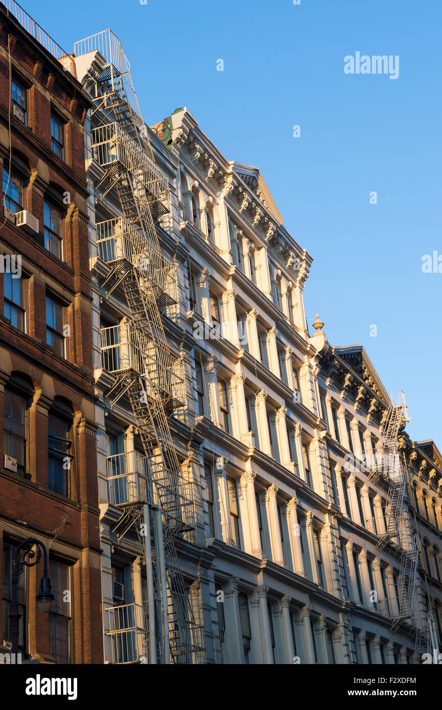 Golden hour view of traditional downtown New York City architecture in the SoHo cast iron historical district Stock Photo